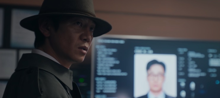 Kang Guk-cheol diante do perfil do Kim